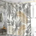Détail de rideau de douche montrant un design moderne imprimé de feuilles tropicales. - H-0936