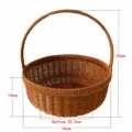 Detailed view of large brown plastic wicker picnic basket with sturdy handle for daily shopping. - Large Round Watermelon Blue