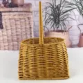 Woven picnic basket with single handle, durable storage container for shopping and outdoor use. - Oval Square Bottom Basket