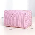 Pink white striped cosmetic makeup bag detail view, dimension display compact toiletry storage pouch. - Pink Striped Cosmetic Storage Bag