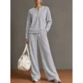 Grey lounge set featuring a V-neck long sleeve sweatshirt and wide-leg pants for casual wear. - Gray