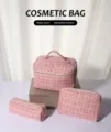 Detail view of 3-piece pink tweed cosmetic bag set with gold zippers and handy carry handle. - Medium / Pink