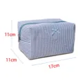 Blue and white striped cosmetic bag with zipper and cute bow, 17x11x11cm toiletry pouch. - Blue Striped Cosmetic Storage Bag
