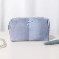 Blue and white striped seersucker cosmetic bag with cute bow, large capacity travel makeup pouch. - Blue Bow Striped