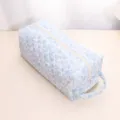 Quilted floral storage bag for hair dryer and curling iron, portable cosmetic organizer. - White Orchid Floral Styling Handbag