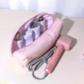 Pink waffle storage bag detail view with organized slots for hair styling tools. - Pink Waffle Grid Hair Styling Wand Storage Bag