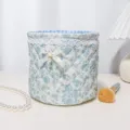 Cute quilted floral storage basket with lace trim and bow for desk organization and home decor. - 18x15 / White Background Orchid [Lace Quilted Cylindrical Storage Basket]