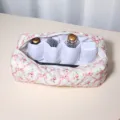 Quilted storage bag with floral ribbon pattern and multi-compartments for hair tools. - Butterfly Love Hair Styling Wand Storage Bag