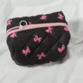 Black quilted makeup bag with pink bow print, soft travel cosmetic pouch organizer zipper. - Quilted Black Red Bow Square Bag
