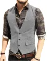 Detailed view of the men's grey herringbone waistcoat showing texture and button design. - XS / Silver