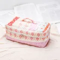 Quilted cosmetic storage bag detailed view, floral patchwork design with handle and zipper closure. - Color Block Multifunctional Hair Care Makeup Storage
