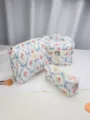 Quilted floral cosmetic bag set, elegant toiletry storage pouch detail view showcase. - Blue Bow Quilted Cosmetic Storage Bag 3-Piece Set