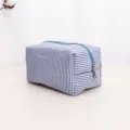 Blue and white striped makeup bag, portable toiletry pouch, travel storage organizer. - Blue Pleated Medium Cosmetic Bag