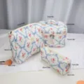 Quilted floral cosmetic bag set with blue ribbons, multi-functional travel makeup pouch. - Three-Piece Set / Blue Large Bow Print Cosmetic Bag Set
