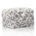 Floral quilted cosmetic bag, portable padded makeup pouch, cute travel storage zipper bag - Quilted French Black Floral White Bag