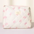 Quilted cosmetic bag with pink bows, large capacity padded makeup pouch for daily travel storage. - White Pink Bow Floral Cosmetic Bag