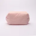 Pink waffle cosmetic bag with cute bow, portable large capacity travel makeup storage pouch. - Pink Waffle Cosmetic Storage Bag