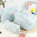 Floral quilted cosmetic bag set, cute portable travel makeup pouch and storage organizer for women. - White Orchid Quilted Cosmetic Storage Bag 3-Piece Set