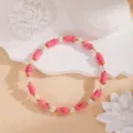 Delicato braccialetto di perline rosa con perle bianche e raffinati dettagli dorati. - 9#