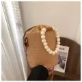 Woven straw bucket bag with wooden bead handle and crossbody strap, stylish summer beach bag. - Khaki