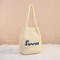 Beige woven straw tote bag with Summer embroidery, casual summer beach shoulder bag style. - Off White