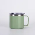 Detail view of the mini portable 14oz stainless steel coffee mug with handle and clear lid. - Light Green