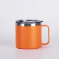 Stainless steel coffee mug detail showing orange matte finish, clear lid, and sturdy handle. - Orange