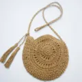 Round straw woven crossbody bag with cute tassels and hollow design, perfect for beach. - Edge Zipper / Khaki