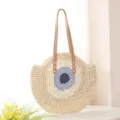 Round straw shoulder bag with blue swirl design, stylish handmade beach tote for women. - Off-White with Blue Core