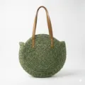 Round green straw shoulder bag, handmade woven beach tote with brown leather handles for women. - Solid Green