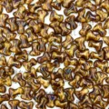 Closeup detail of Czech glass bone beads in brown mottled color for DIY accessories. - Vintage Brown Mottled
