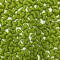 Close-up detail of Czech glass T-bone beads in green, 2x8mm size for DIY jewelry crafts. - Green
