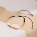 Elegante bracelet de perles fait à main réglable avec cordon noir et perles colorées. - Style 4