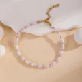 Elegant beaded pearl bracelet detail shot showcasing white and purple bead mix design. - Pearl Purple