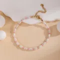 Elegant minimalist beaded bracelet with white and pink pearls, adjustable gold chain. - Pearl Pink