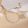 Elegant minimalist pearl and turquoise bead bracelet with adjustable gold chain, delicate detail. - Pearl Teal