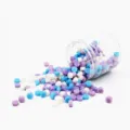 Octagonal sealing wax beads in mixed colors, approximately 150 pieces in a clear jar. - Bottled Wax Beads - Starry Night