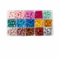 Transparent partitioned box with colorful sealing wax beads for stamp craft DIY projects. - Cherry Blossom Wax Beads - 15 Grids (Approx. 330 Beads)