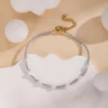 Handmade beaded bracelet with gray seed beads and white pearls, adjustable gold chain detail. - Gray