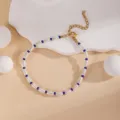 Elegant mixed bead pearl bracelet with blue rice beads and adjustable gold chain detail view - Pearl Dark Blue