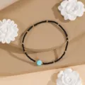 Minimalist woven seed bead bracelet with turquoise stone and metallic gold spacers for women - Style #11