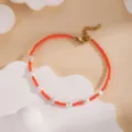 Handmade red seed bead and white pearl beaded bracelet with gold extension chain. - Red