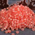 Perline di conteria Miyuki 2mm argentate dentro, perline tonde rosa corallo per gioielli. - 10.00g / rosa corallo