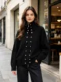 Black knitted cardigan featuring a high collar, zipper closure, and stylish gold button details. - One Size / Tops / Black