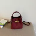 Burgundy suede bucket bag with top handle and shoulder strap, stylish retro design. - Red (Without Pendant) / 17*11*17