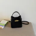Black suede leather bucket bag with metal turn lock, stylish retro shoulder handbag. - Black (Without Pendant) / 17*11*17