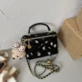 Sweet polka dot handbag with bow and bear pendant, stylish chain crossbody bag for women. - Black