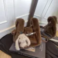 Brown plush handbag with cute bunny charm, stylish winter shoulder bag with metal lock detail. - Brown