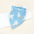 Close-up of blue baby bib with cute white duck print, soft cotton gauze fabric detail. - White Goose