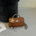 Brown quilted chain shoulder bag with metal lock and woven flower charm for women SKU style - Brown